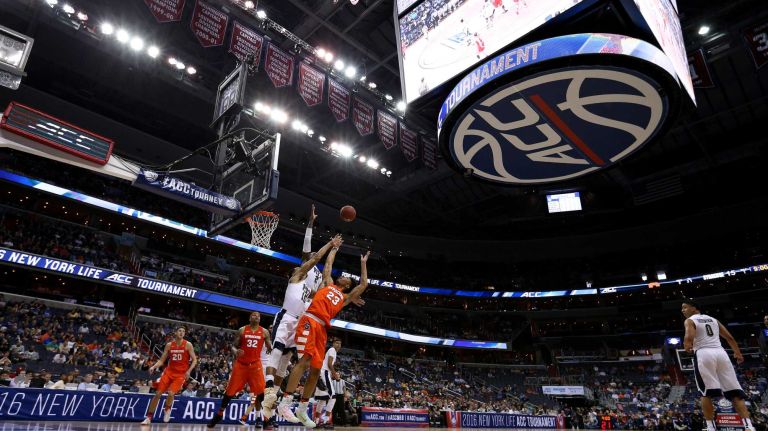 Syracuse vs. Pitt in ACC Tournament 18 Malachi Richardson #23 of the Syracuse Orange puts up a shot in front of Sterling Smith #15 and Michael Young #2 of the Pittsburgh Panthers during the first half in the second round of the 2016 ACC Basketball Tournament at Verizon Center on March 9, 2016 in Washington, DC.