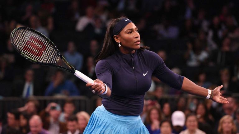 Serena Williams looks to return to Caroline Wozniacki during the 9th annual BNP Paribas Showdown at Madison Square Garden on Tuesday, March 8, 2016.