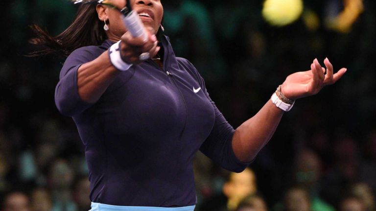 Serena Williams returns to Caroline Wozniacki during the 9th annual BNP Paribas Showdown at Madison Square Garden on Tuesday, March 8, 2016.