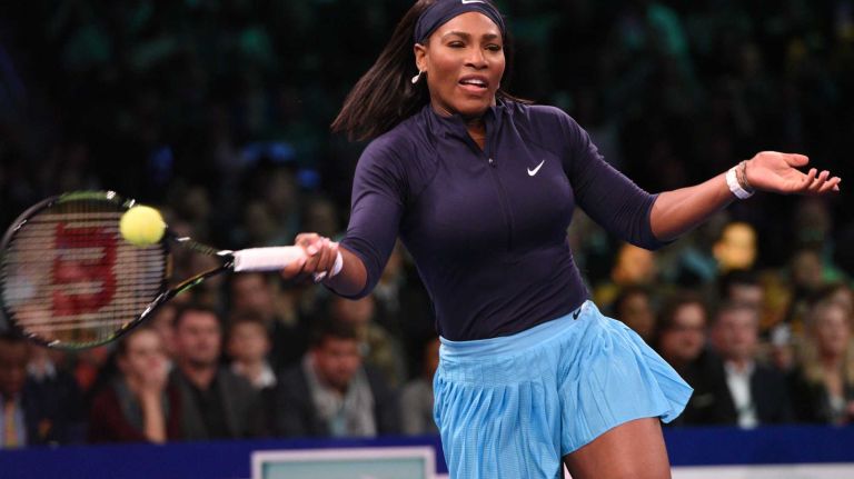 Serena Williams returns to Caroline Wozniacki during the 9th annual BNP Paribas Showdown at Madison Square Garden on Tuesday, March 8, 2016.