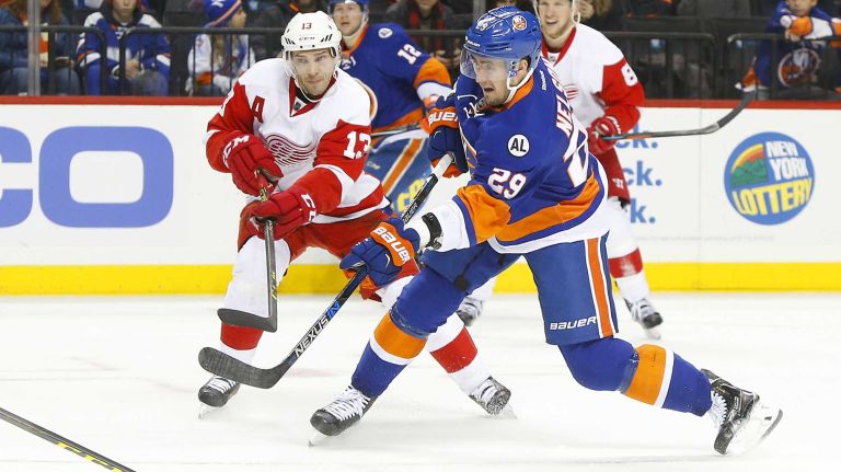 Brock Nelson #29 of the New York Islanders shoots the puck against Pavel Datsyuk #13 of the Detroit Red Wings at Barclays Center on Monday, Feb. 15, 2016 in Brooklyn, New York.