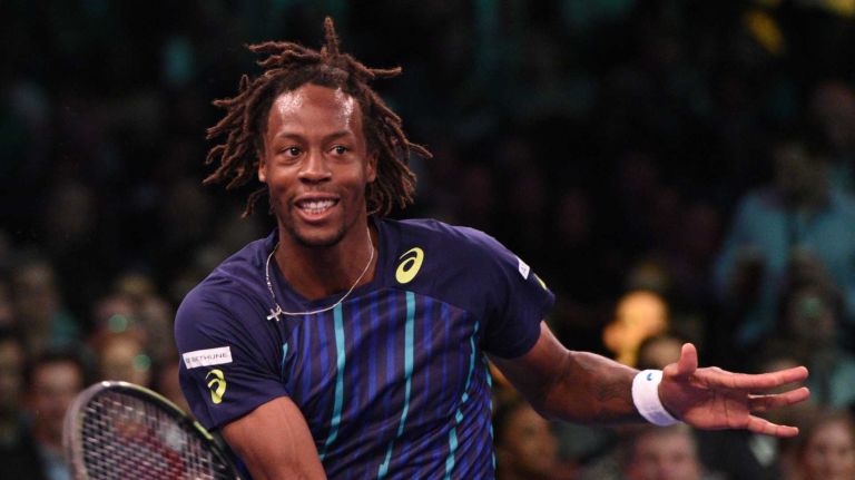 Gael Monfils returns to Stan Wawrinka during the 9th annual BNP Paribas Showdown at Madison Square Garden on Tuesday, March 8, 2016.