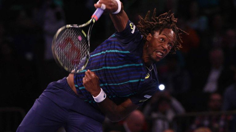 Gael Monfils serves to Stan Wawrinka during the 9th annual BNP Paribas Showdown at Madison Square Garden on Tuesday, March 8, 2016.