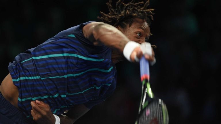 Gael Monfils serves to Stan Wawrinka during the 9th annual BNP Paribas Showdown at Madison Square Garden on Tuesday, March 8, 2016.