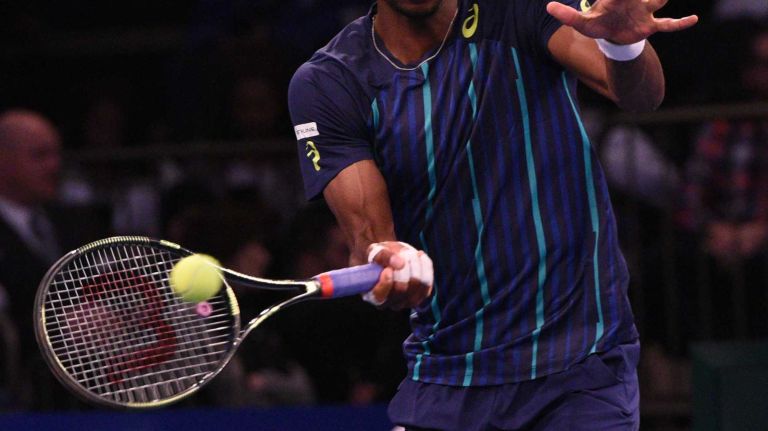 Gael Monfils returns to Stan Wawrinka during the 9th annual BNP Paribas Showdown at Madison Square Garden on Tuesday, March 8, 2016.