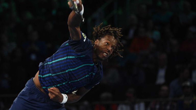 Gael Monfils serves to Stan Wawrinka during the 9th annual BNP Paribas Showdown at Madison Square Garden on Tuesday, March 8, 2016.