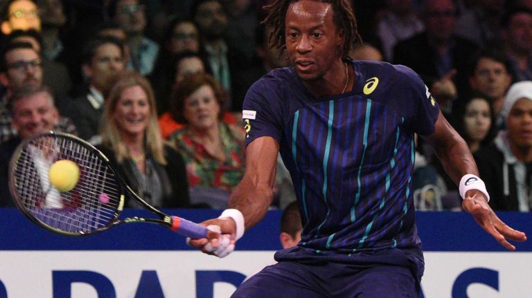 Gael Monfils returns to Stan Wawrinka during the 9th annual BNP Paribas Showdown at Madison Square Garden on Tuesday, March 8, 2016.