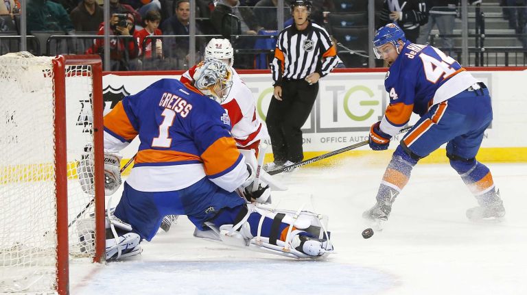 Thomas Greiss #1 of the New York Islanders makes a save in the second period against the Detroit Red Wings at Barclays Center on Monday, Feb. 15, 2016 in Brooklyn, New York.