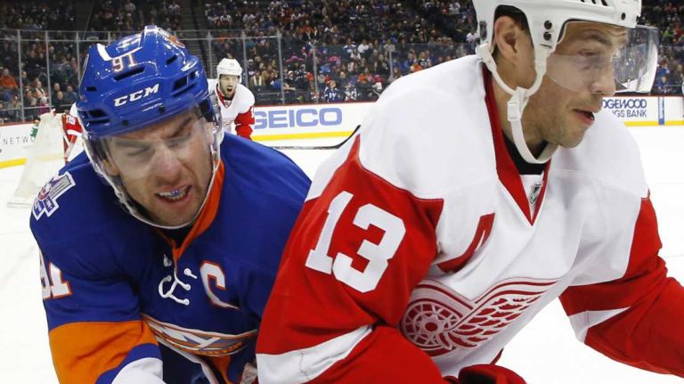 John Tavares of the New York Islanders skates against Pavel Datsyuk of the Detroit Red Wings in the first period at Barclays Center on Monday, Feb. 15, 2016.