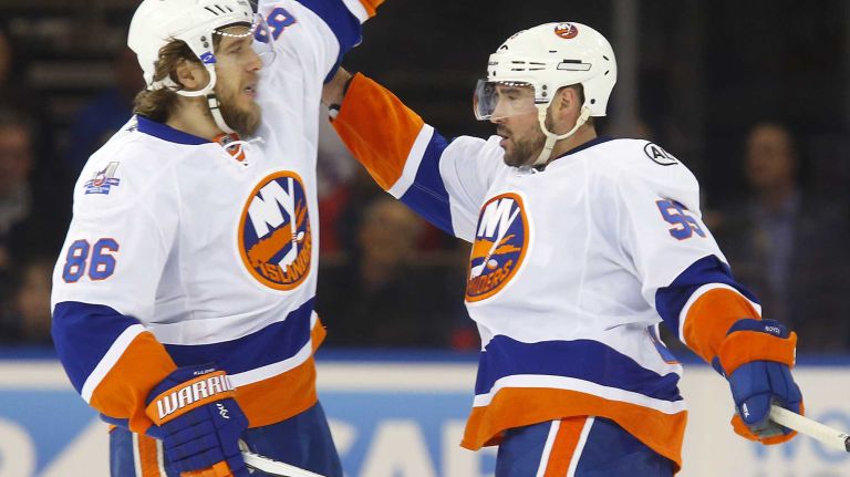 Islanders vs. Rangers 20 Johnny Boychuk of the New York Islanders celebrates second goal of the first period against the New York Rangers with teammate Nikolay Kulemin at Madison Square Garden on Sunday, March 6, 2016.