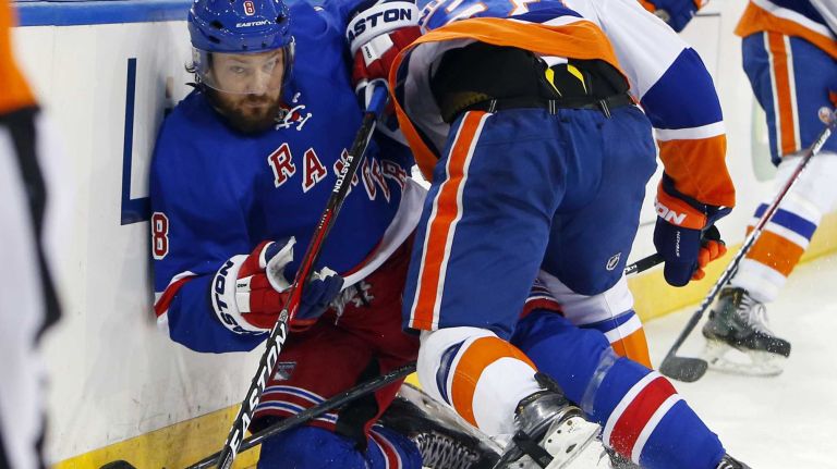 Islanders vs. Rangers 21 Frans Nielsen of the New York Islanders checks Kevin Klein of the New York Rangers in the second period at Madison Square Garden on Sunday, March 6, 2016.
