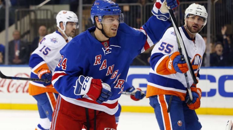 Islanders vs. Rangers 29 Oscar Lindberg of the New York Rangers celebrates his first-period goal against the New York Islanders at Madison Square Garden on Sunday, March 6, 2016.