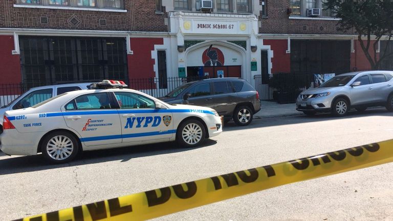 A plan to prevent bullying at schools was announced by city officials on Oct. 30, 2017. Above, a cop car sits outside the Urban Assembly School for Wildlife Conservation  in the Bronx after a fatal stabbing on Sept. 27, 2017.