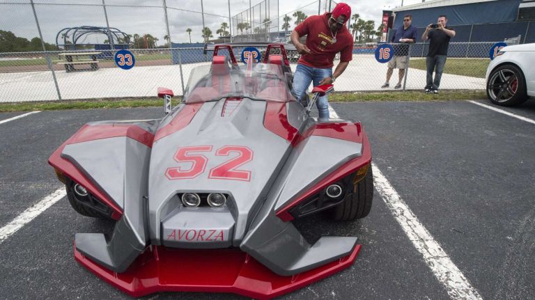 Yoenis Cespedes drove his customized Polaris Slingshot to Mets training camp on Tuesday, Feb. 23, 2016 in Port St. Lucie, Fla.