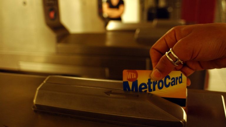 Goodbye to Metrocards and turnstile jams 1 An MTA passenger swipes a MetroCard at the Canal Street subway station.