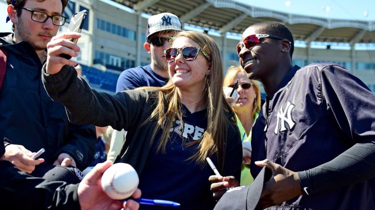 New York Yankees spring training 2016 98 New York Yankees' Didi Gregorius takes a photo with fans during spring training at George M. Steinbrenner Field in Tampa, Fla. on Feb. 27, 2016.