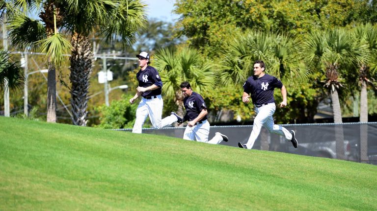 New York Yankees spring training 2016 138 The New York Yankees work out on the hill at Field 3 during spring training at George M. Steinbrenner Field in Tampa, Fla. on Sunday, Feb. 21, 2016.
