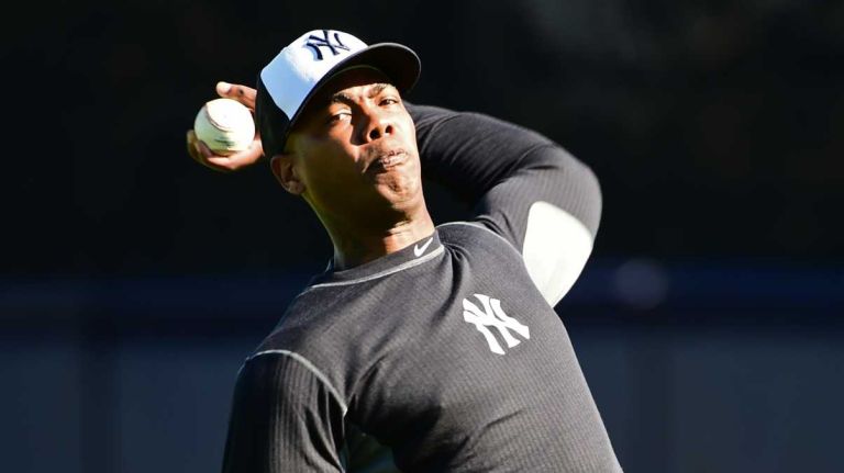 New York Yankees spring training 2016 153 New York Yankees' Aroldis Chapman works out during the first day of spring training at George M. Steinbrenner Field in Tampa Fla. on Thursday, Feb. 18, 2016.