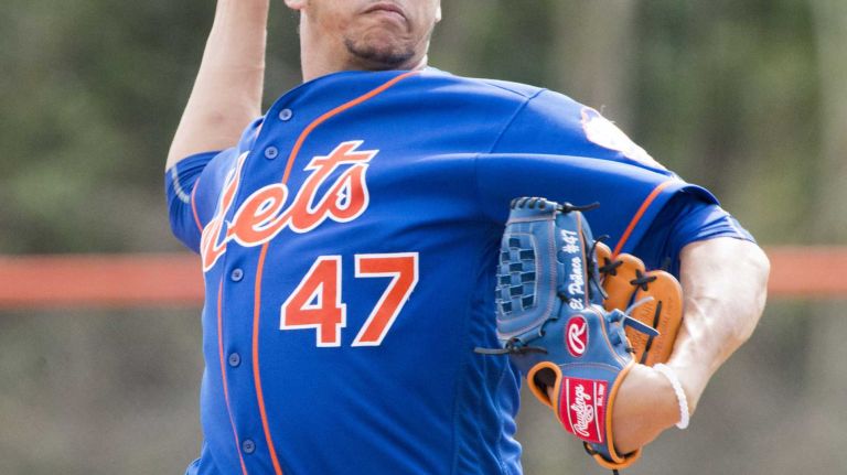 New York Mets pitcher Hansel Robles throws a live batting session on Monday, Feb. 29, 2016 during a spring training workout in Port St. Lucie, Fla.