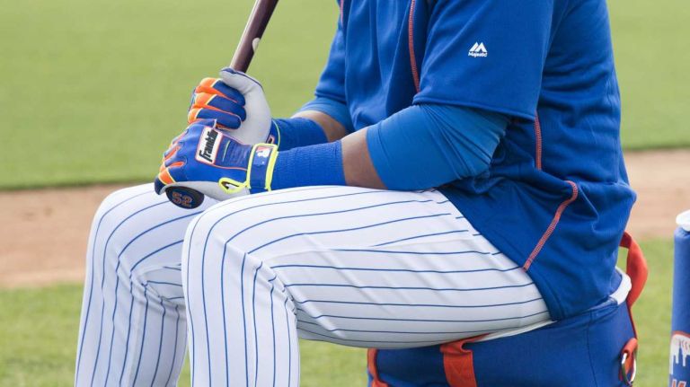 NY Mets outfielder Yoenis Cespedes gets ready for batting practice during a spring training workout, Monday Feb. 22, 2016 in Port St. Lucie, Fla.