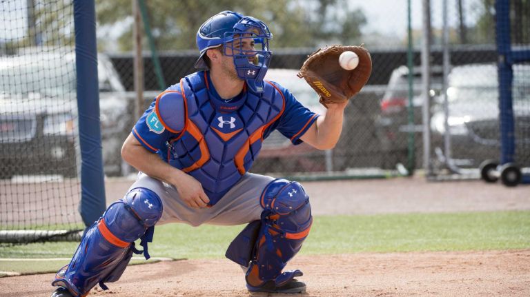 New York Mets catcher Travis d'Arnaud practices during a spring training workout on Sunday, Feb. 21, 2016 in Port St. Lucie, Fla.