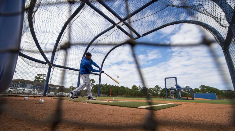 New York Mets outfielder Yoenis Cespedes takes batting practice during a spring training workout on Sunday, Feb. 21, 2016 in Port St. Lucie, Fla.