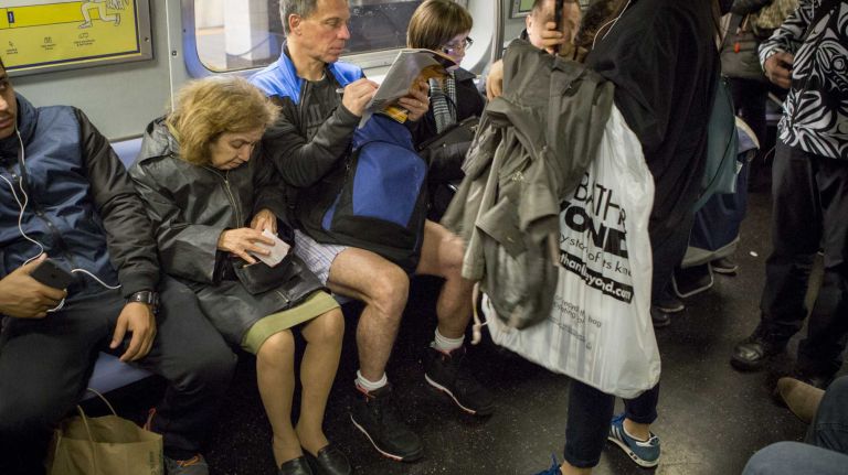 A participant in the No Pants Subway Ride rides a train in his underwear in New York on Jan. 10, 2016.
