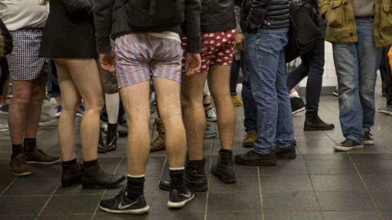 Participants in the No Pants Subway Ride wait for a train in their underwear in a Manhattan subway station on Jan. 10, 2016.