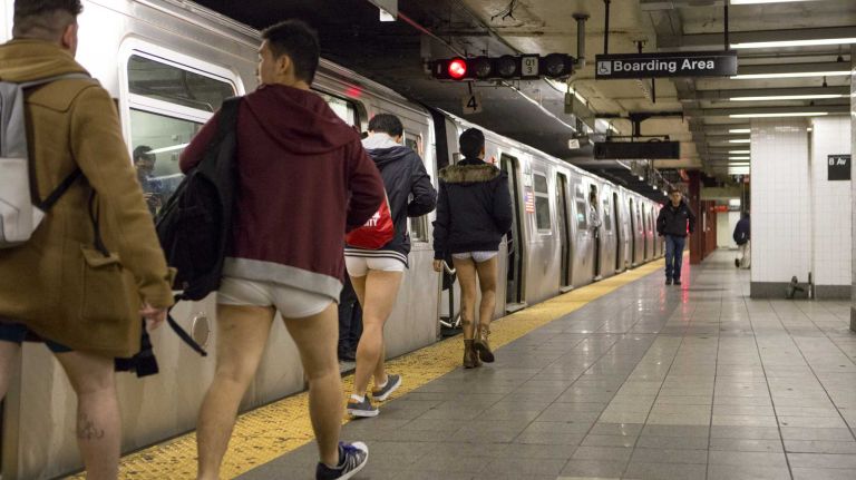 Participants in the No Pants Subway Ride wait for a train in their underwear in a New York subway station on Jan. 10, 2016.