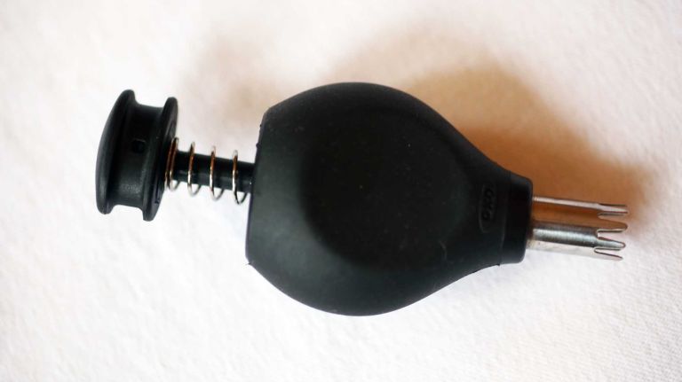 Throw away any kitchen utensil whose purpose you can't remember or which you haven't used in a year, like this strawberry huller.