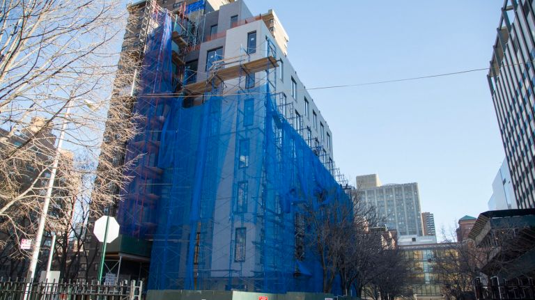 nARCHITECTS' Carmel Place in contruction on Jan. 5, 2015. It is the first building to have micro-unit apartments in New York City, and will be one of the first multi-unit Manhattan buildings to be using modular construction.