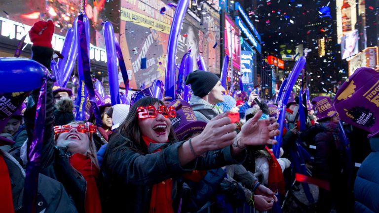 New Year's Eve in NYC 2015 to 2016: Pictures of the ball drop in Times Square and more 27 Beca Clakins, from left, and Sayra Garcia, from New Mexico, celebrate New Year's Eve during a performance in Times Square, on Thursday, Dec. 31, 2015.