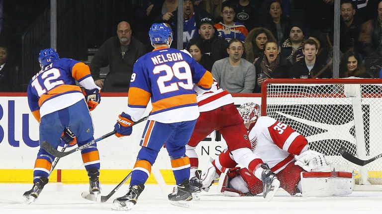 Josh Bailey #12 of the New York Islanders scores a second period goal past Jimmy Howard #35 of the Detroit Red Wings at Barclays Center on Monday, Feb. 15, 2016 in Brooklyn, New York.