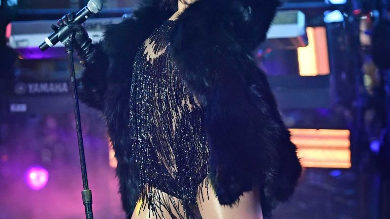 New Year's Eve in NYC 2015 to 2016: Pictures of the ball drop in Times Square and more 34 Demi Lovato performs for revelers as they ring in the New Year in Times Square on New Year's Eve. Dec. 31, 2015