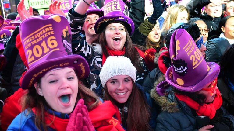 New Year's Eve in NYC 2015 to 2016: Pictures of the ball drop in Times Square and more 36 New Year's Eve revelers celebrate in Times Square on Dec. 31, 2015.