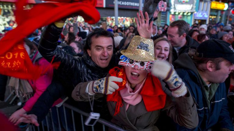 New Year's Eve in NYC 2015 to 2016: Pictures of the ball drop in Times Square and more 39 People celebrate New Year's Eve while the performers rehearse Thursday evening, Dec. 31, 2015, in Times Square.