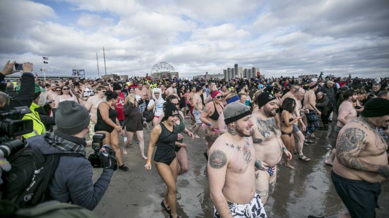 In Brooklyn, swimmers prove they are up to the challenge of the Coney Island Polar Bear Plunge on Jan. 1, 2016.