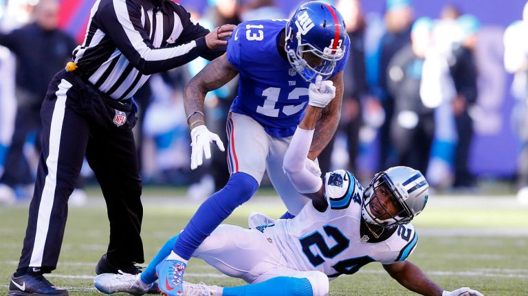 Odell Beckham Jr. vs. Josh Norman 16 Giants' Odell Beckham Jr. and Panthers' Josh Norman mix it up during first half.