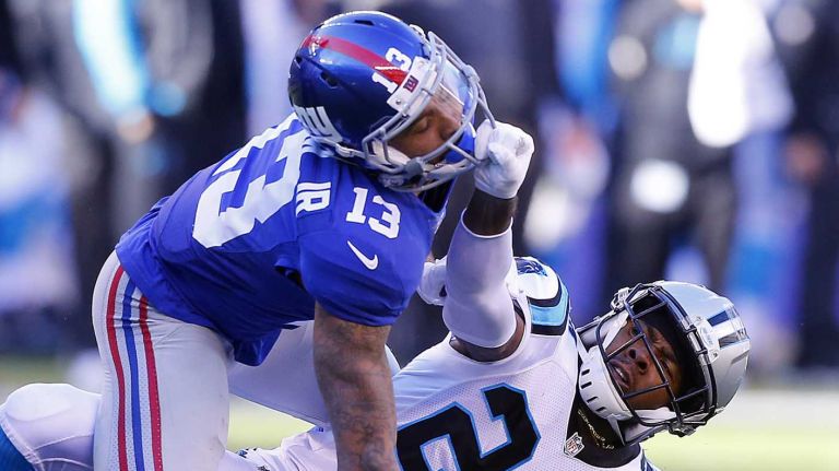 Odell Beckham Jr. vs. Josh Norman 18 Josh Norman #24 of the Carolina Panthers mixes it up with Odell Beckham #13 of the New York Giants after a play in the first half at MetLife Stadium on Sunday, Dec. 20, 2015 in East Rutherford, N.J.
