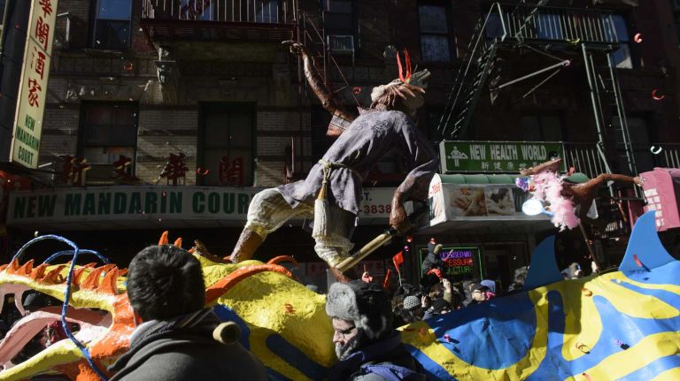Participants carry monkeys and a dragon to welcome the Year of the Monkey during the annual Lunar New Year Parade in Manhattan's Chinatown on Sunday, Feb. 14, 2016. The monkey is the ninth of the 12-year cycle of animals that appear in the Chinese zodiac, related to the Chinese calendar.