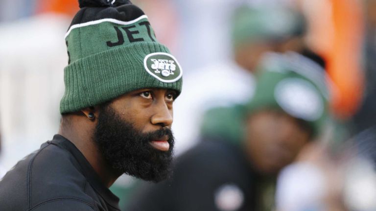 Darrell Revis #24 of the New York Jets looks on from the bench during the game against the New York Giants at MetLife Stadium on Sunday, Dec. 6, 2015 in East Rutherford, N.J.