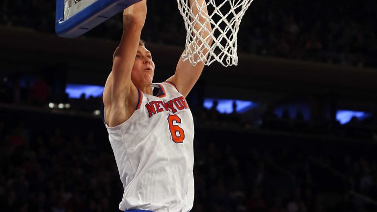 Knicks vs. Heat 25 Kristaps Porzingis #6 of the New York Knicks dunks the ball in the first hakf against the Miami Heat at Madison Square Garden on Friday, Nov. 27, 2015 in New York City.