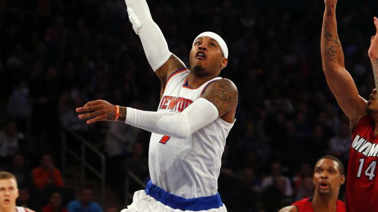 Knicks vs. Heat 30 Carmelo Anthony #7 of the New York Knicks goes to the hoop in the first half against the Miami Heat at Madison Square Garden on Friday, Nov. 27, 2015 in New York City.