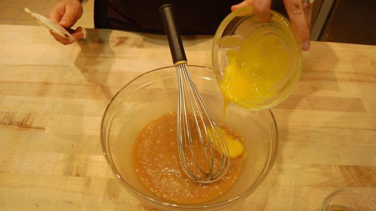 Whisk in egg yolks. Be careful to not over beat. 