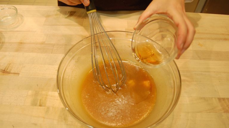 Whisk in melted butter and bourbon. (Note: bourbon can be left out, but it's not recommended.) 