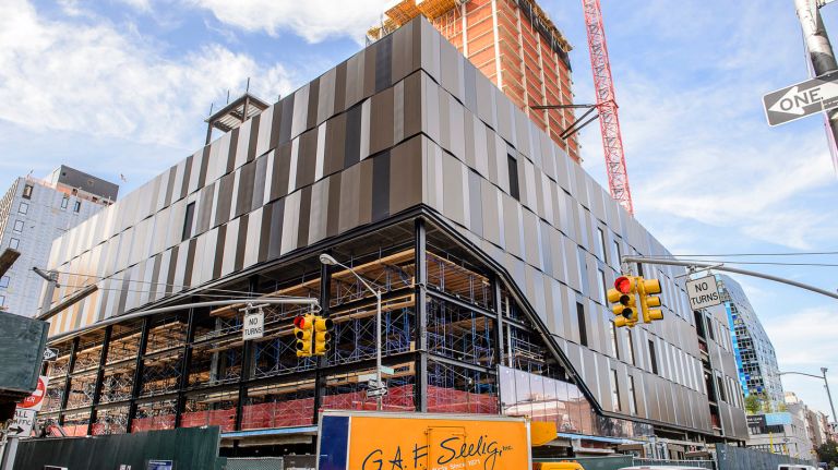 Vendors are thrilled about the wrap-around glass windows featured in Essex Market's future location on the Lower East Side.