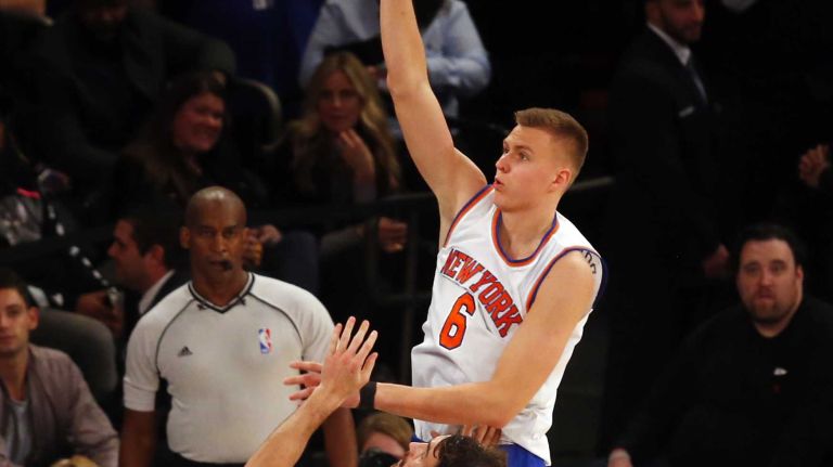 Kristaps Porzingis #6 of the New York Knicks puts up a shot in the fourth quarter against Kevin Love #0 of the Cleveland Cavaliers at Madison Square Garden on Friday, Nov. 13, 2015 in New York City.