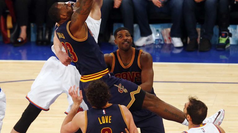 Kristaps Porzingis #6 of the New York Knicks defends against LeBron James #23 of the Cleveland Cavaliers in the fourth quarter at Madison Square Garden on Friday, Nov. 13, 2015 in New York City.