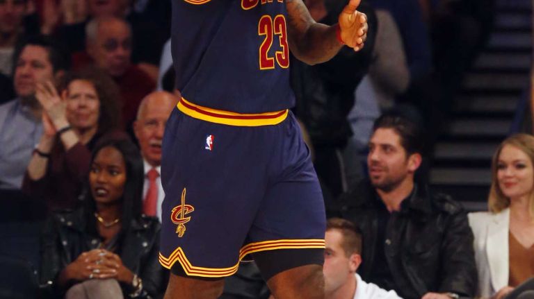 LeBron James #23 of the Cleveland Cavaliers checks his elbow after a first quarter dunk against the New York Knicks at Madison Square Garden on Friday, Nov. 13, 2015 in New York City.