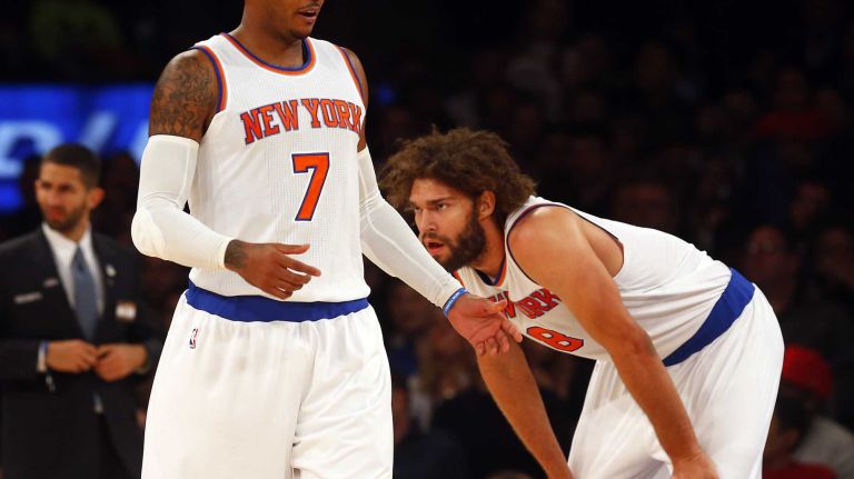 Carmelo Anthony #7 and Robin Lopez #8 of the New York Knicks look on in the first quarter against the Cleveland Cavaliers at Madison Square Garden on Friday, Nov. 13, 2015.